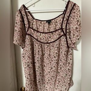 Cream and maroon floral sheer blouse.